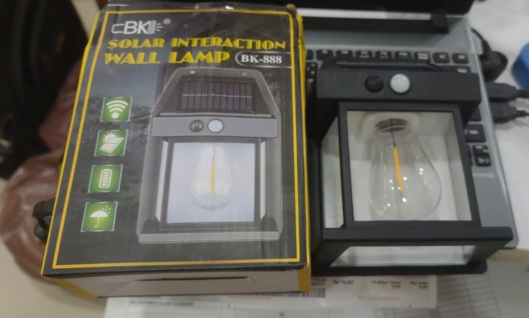 Solar Wall Lamp – Energy-Saving Outdoor Light with Waterproof Design for Home & Garden